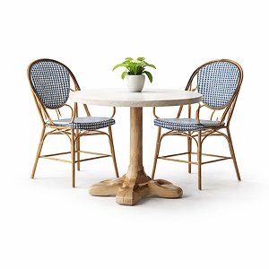 Round wooden dining table with two rattan chairs featuring blue woven seats, styled on a clean white background.